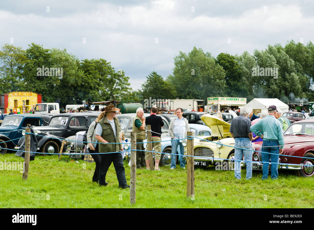 People admiring classic cars at a country festival Stock Photo