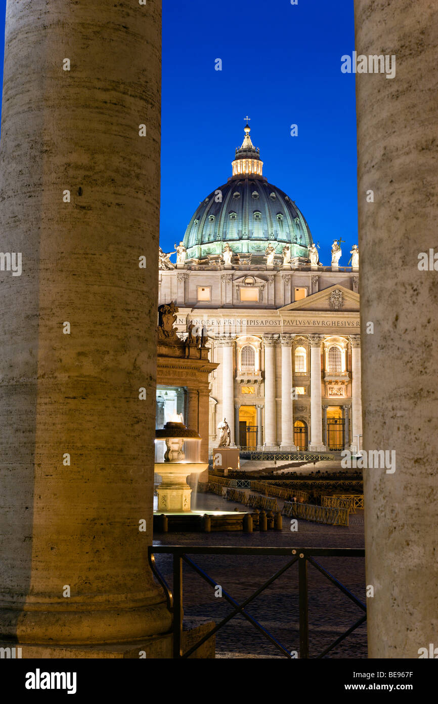 ITALY Lazio Rome Vatican City The Basilica church of St Peter and the square or Piazza San Pietro illuminated at night Stock Photo