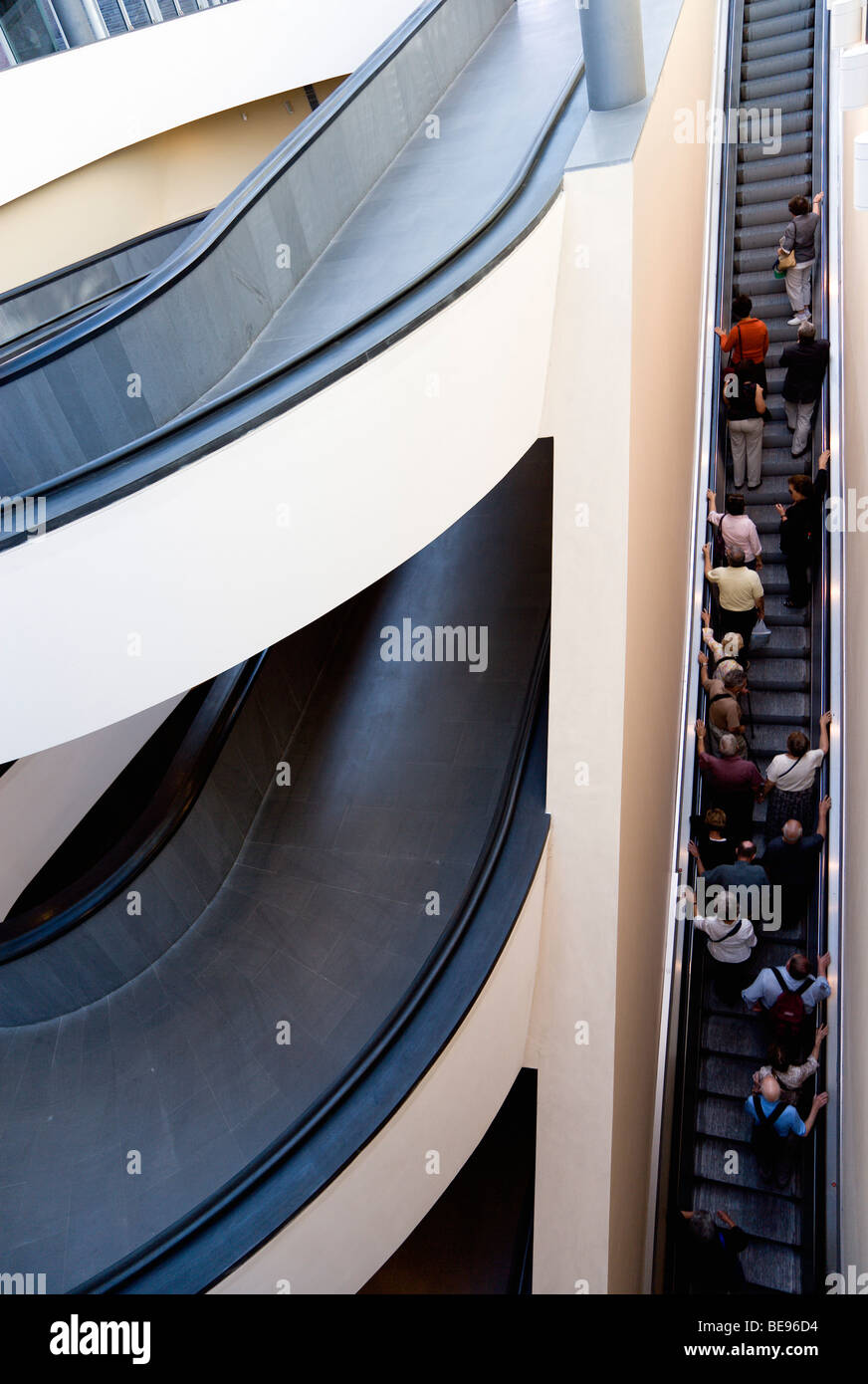 ITALY Rome Lazio Vatican City Museums New spiral ramp and escalator moving upwards with visitors at the entrance to the Museum Stock Photo