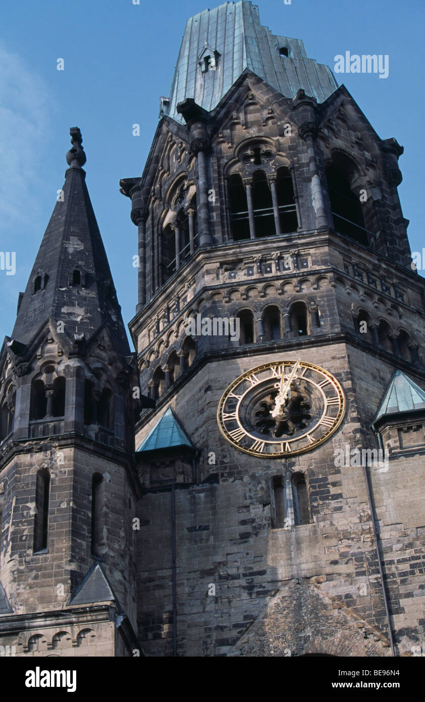 GERMANY Berlin Kaiser Wilhelm Memorial Church. Part view of ruined Gothic exterior with clock face. Stock Photo