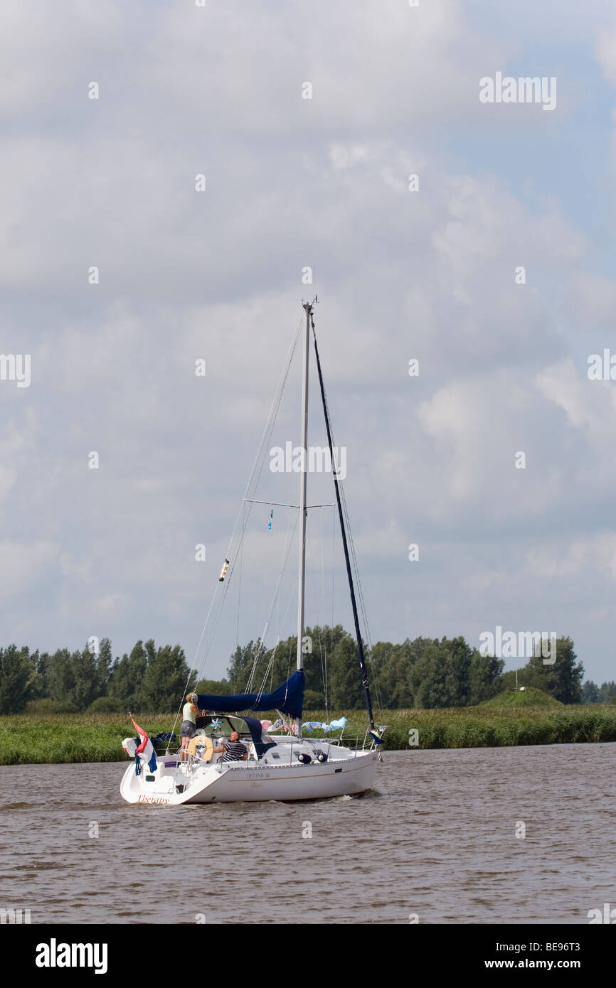 sailing boat in Lauwersmeer National Park; zeilboot in het Nationaal Park Lauwersmeer Stock Photo