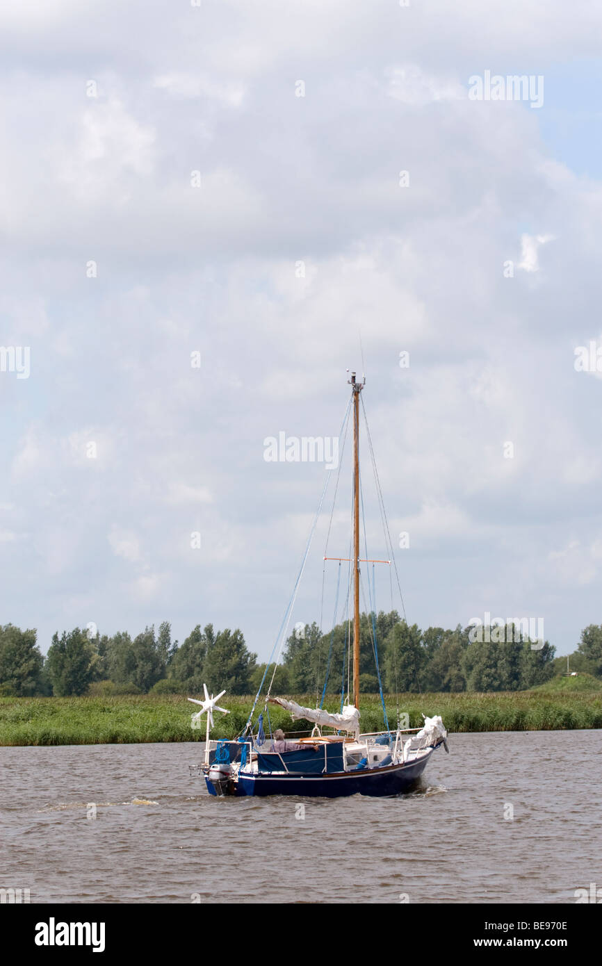 sailing boat in Lauwersmeer National Park; zeilboot in het Nationaal Park Lauwersmeer Stock Photo