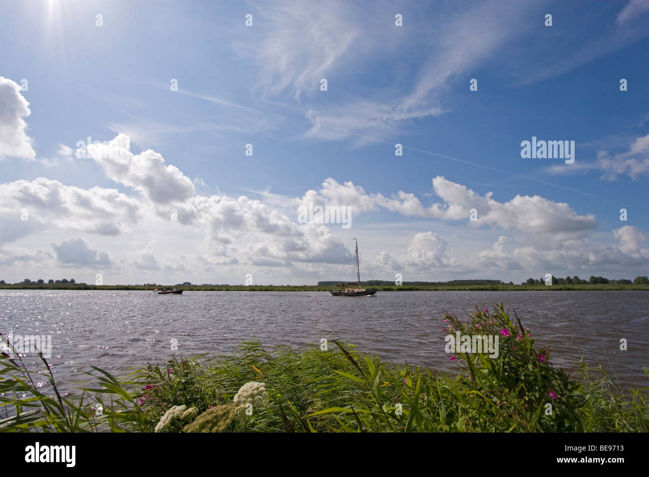 sailing boat in Lauwersmeer National Park; zeilboot in het Nationaal Park Lauwersmeer Stock Photo