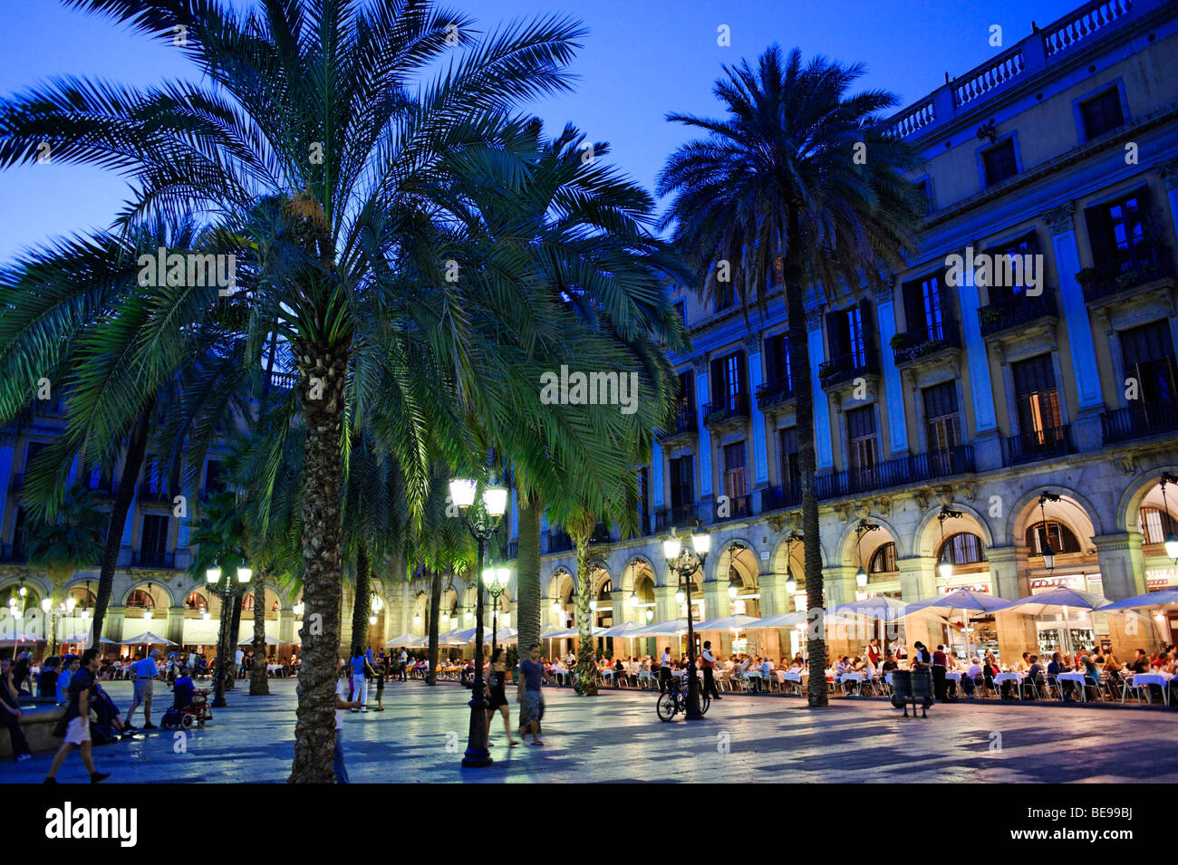 People dining alfresco on Plaza Reial. Barcelona. Spain Stock Photo