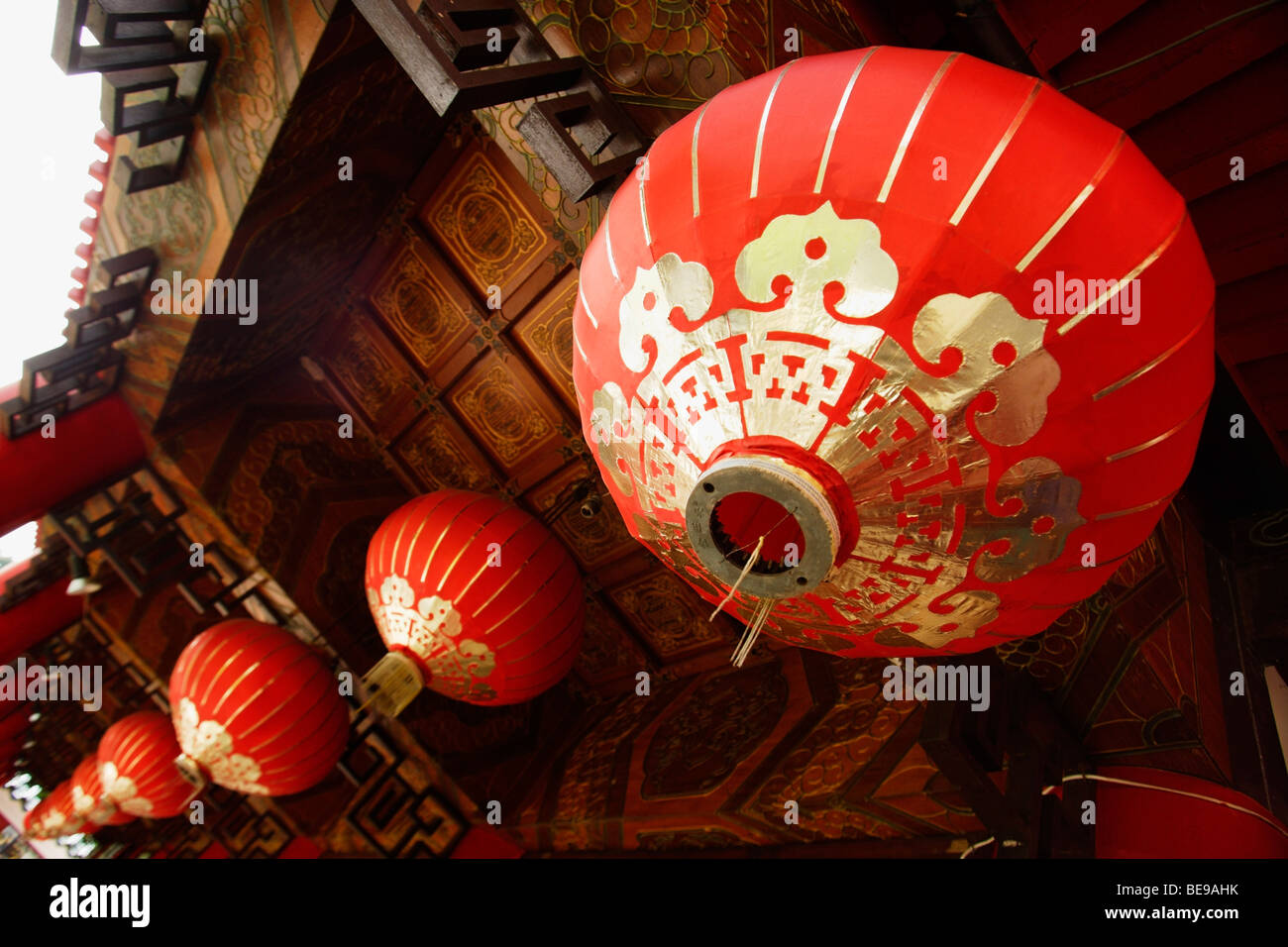 red lanterns hanging from temple roof Stock Photo - Alamy