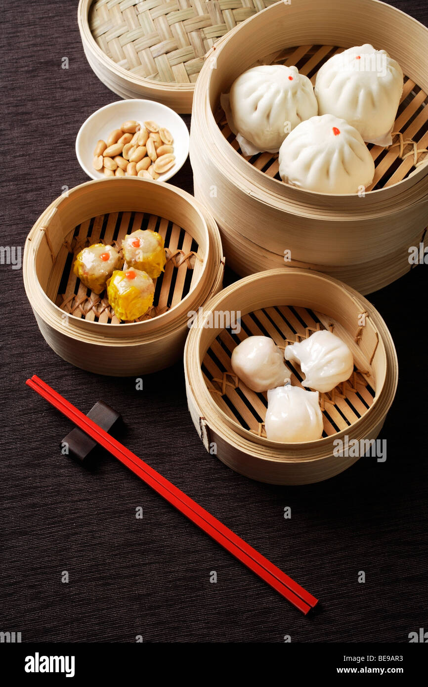 Assortment of dim sum in bamboo steamers Stock Photo Alamy