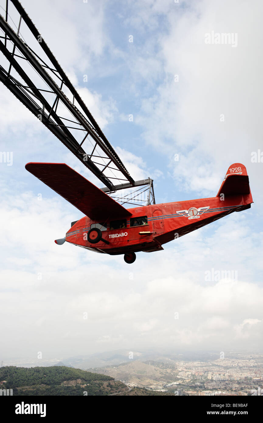 The nostalgic red plane ride simulator Avio in Tibidabo amusement park. Barcelona Spain. Stock Photo