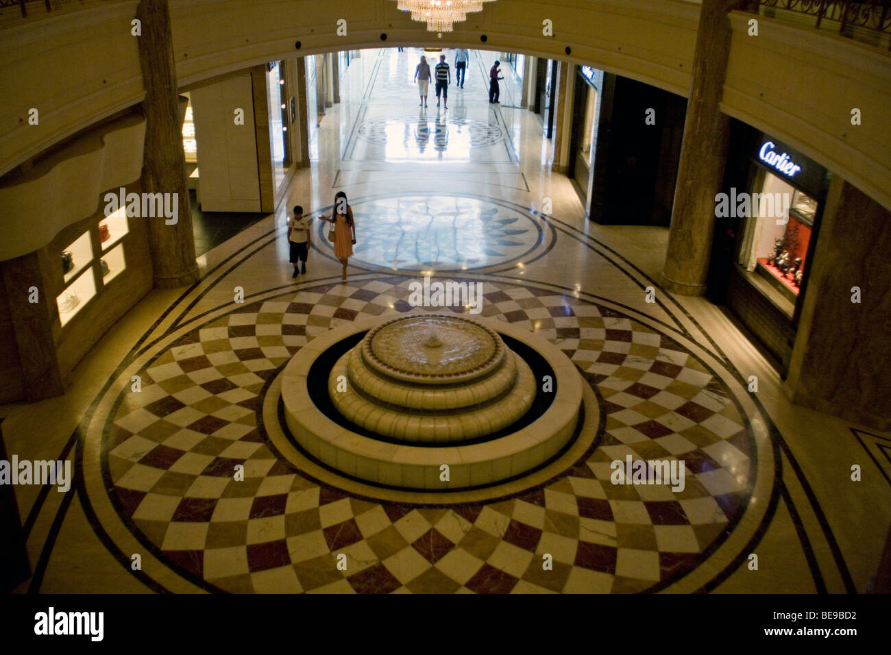 A mother and son walk through the entrance of the DLF Emporio Mall in  Vasant Kunj, New Delhi, India Stock Photo - Alamy