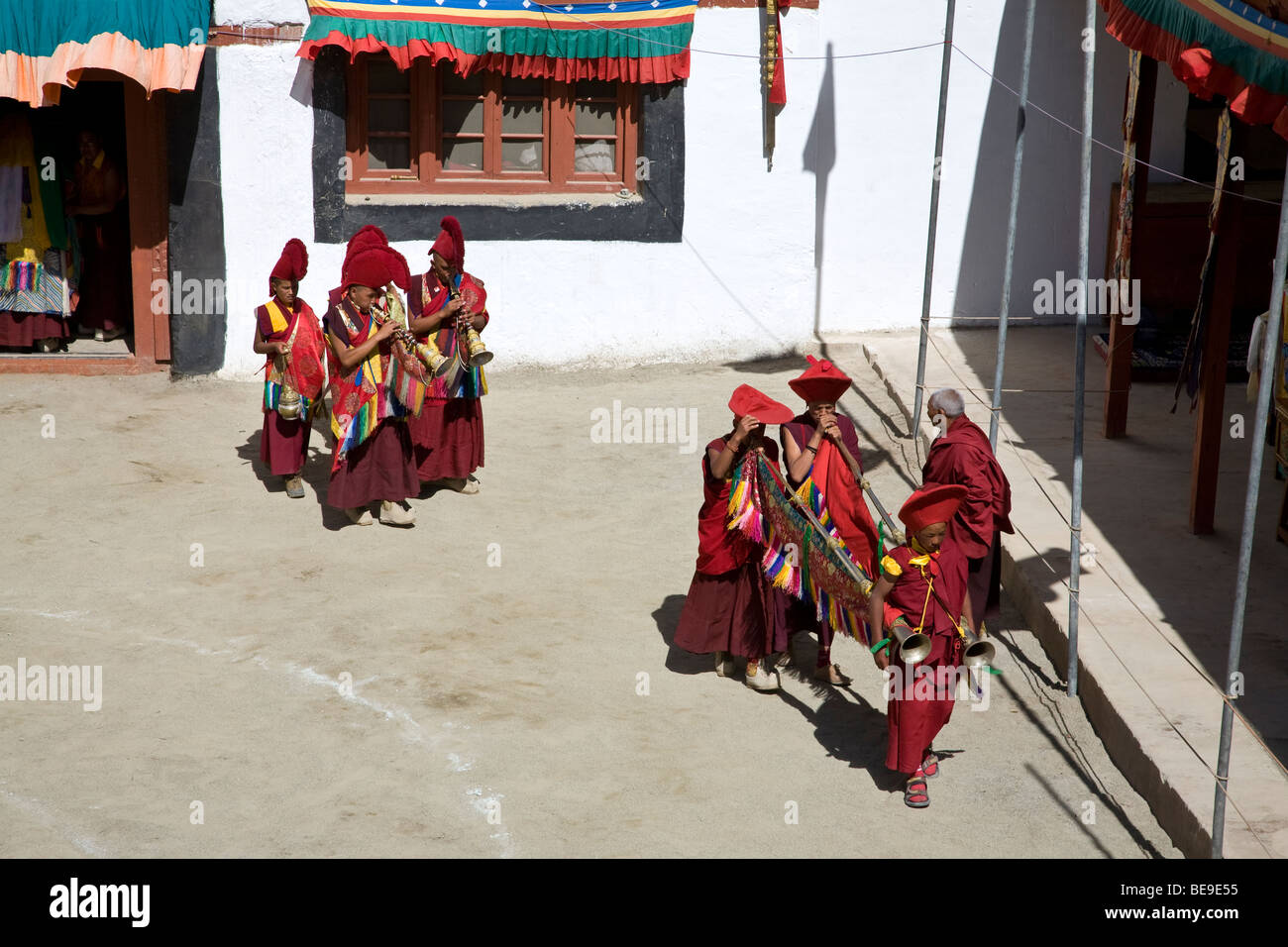 Buddhist monks plating the tibetan horns. Phyang Gompa festival. Ladakh. India Stock Photo