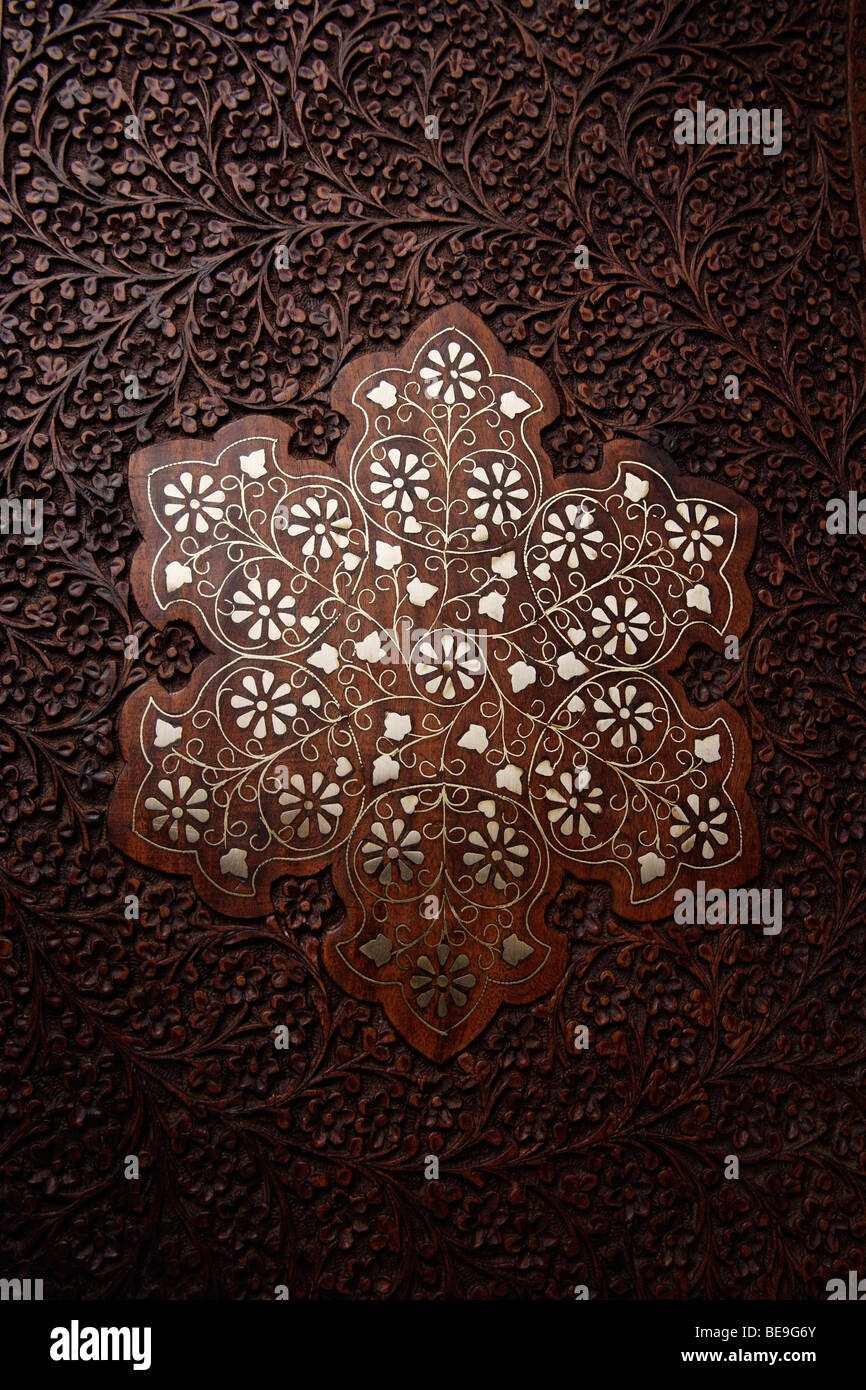Close up of wood carving on Indian table. Stock Photo