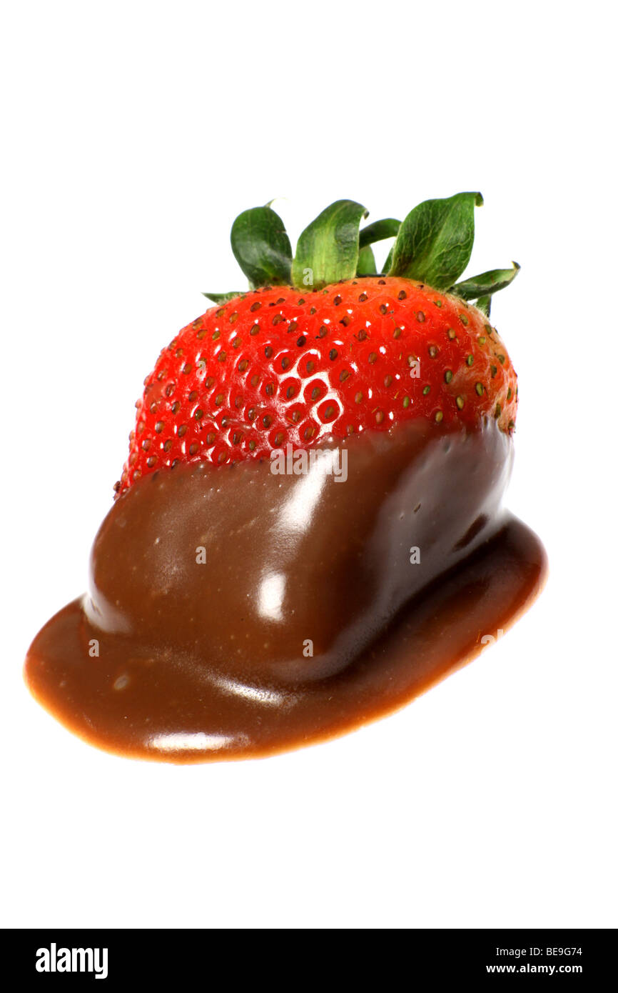 A strawberry after being dipped in chocolate sauce Stock Photo