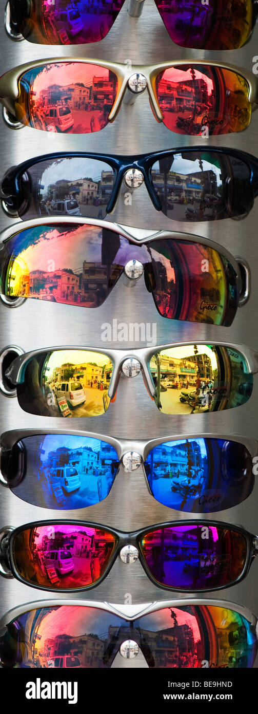 Colourful sunglasses on a rack upright panoramic Stock Photo