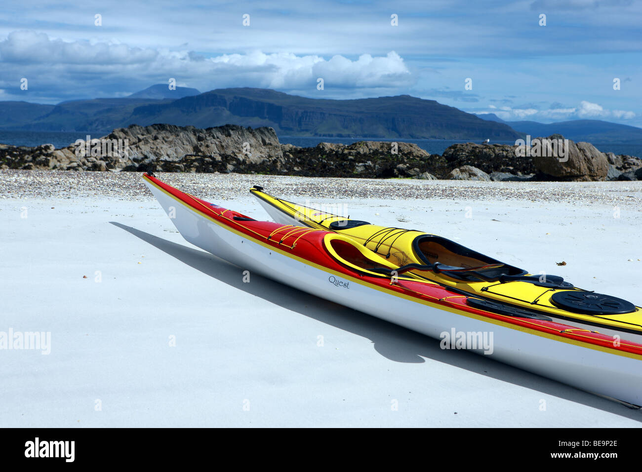 Two kayaks on a sandy beach on a deserted island in the Inner Hebrides Stock Photo