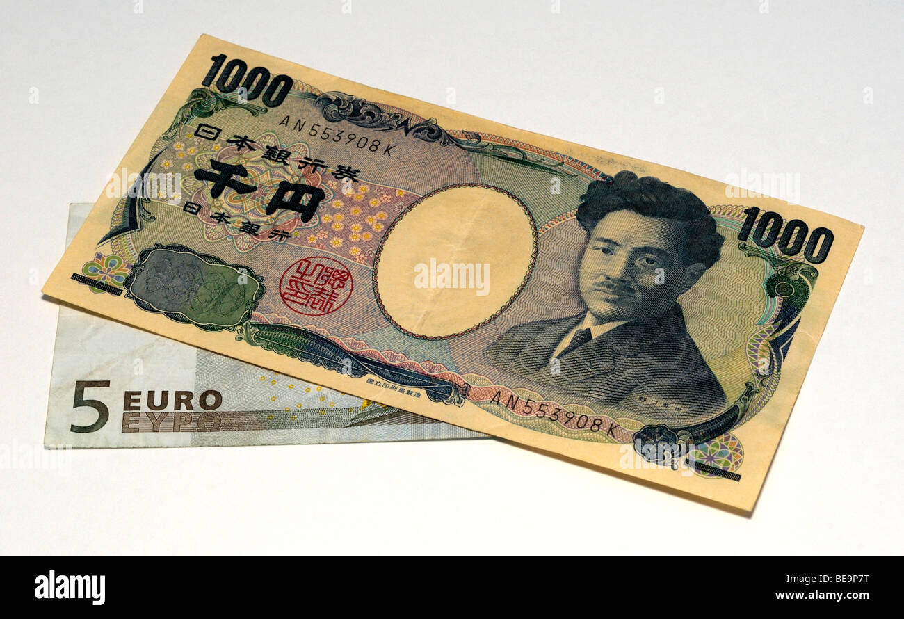 Euro and Japanese Yen Bank Notes. Stock Photo