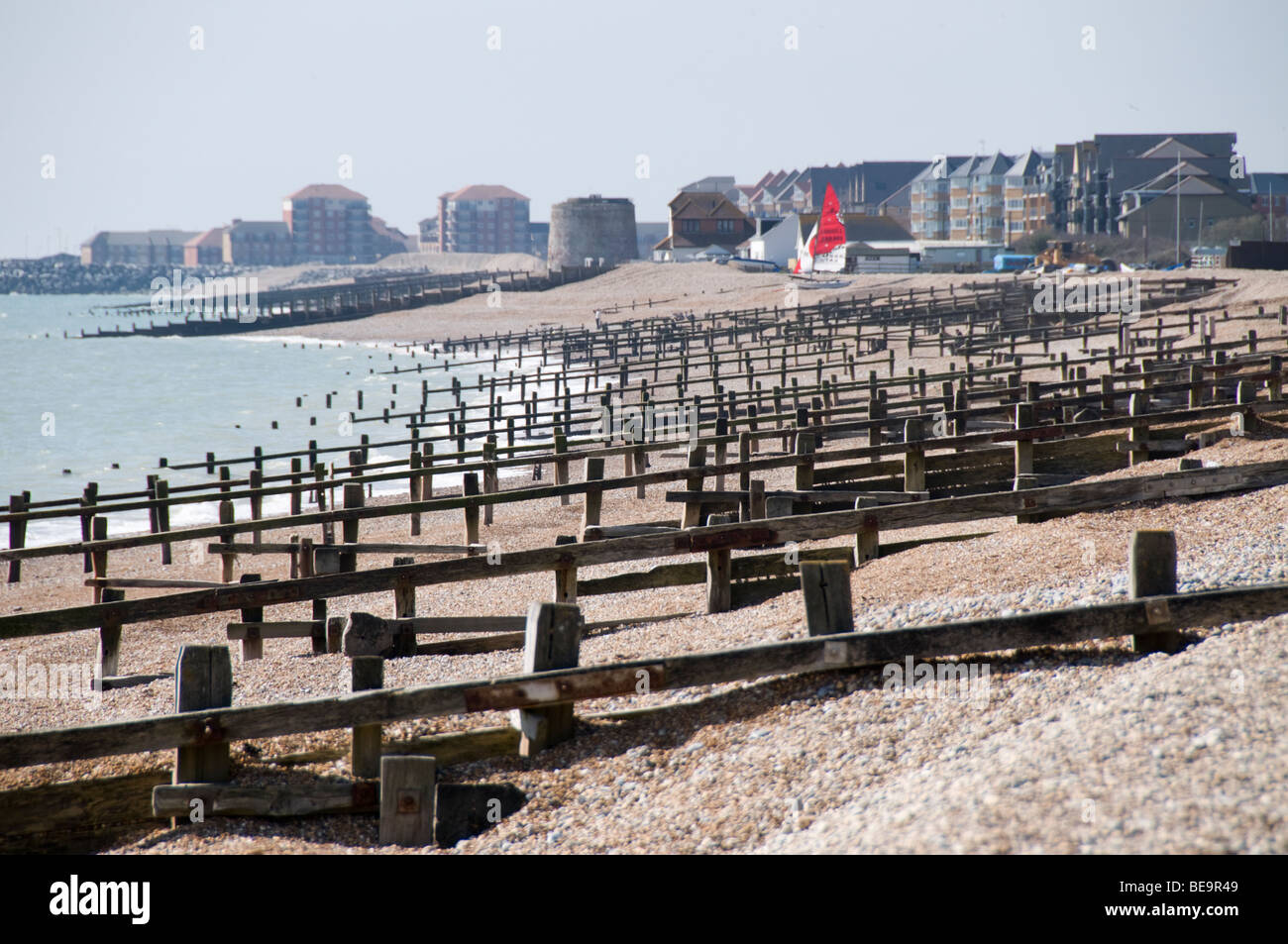 Apartment blocks on the beach, Pevensey Bay, East Sussex, UK Stock Photo
