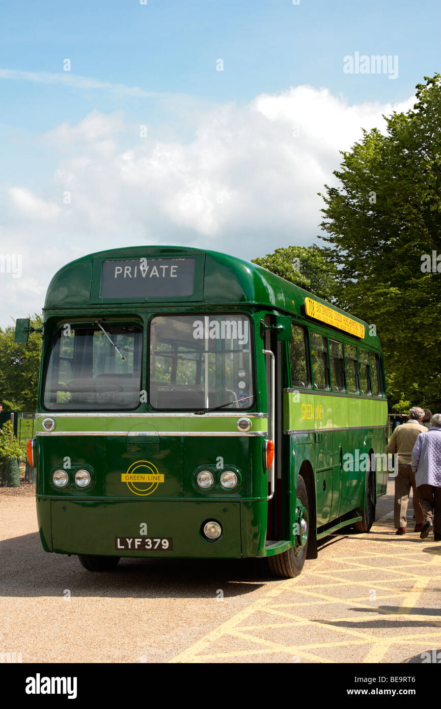 A Green Line coach parked in Surrey England Stock Photo