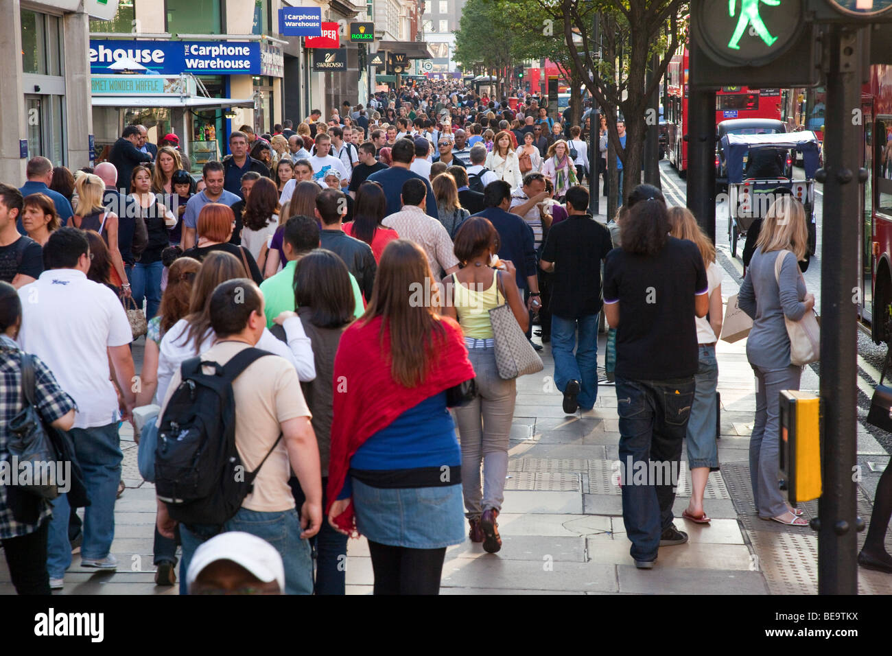 People shopping in crowded Oxford Street London. Stock Photo