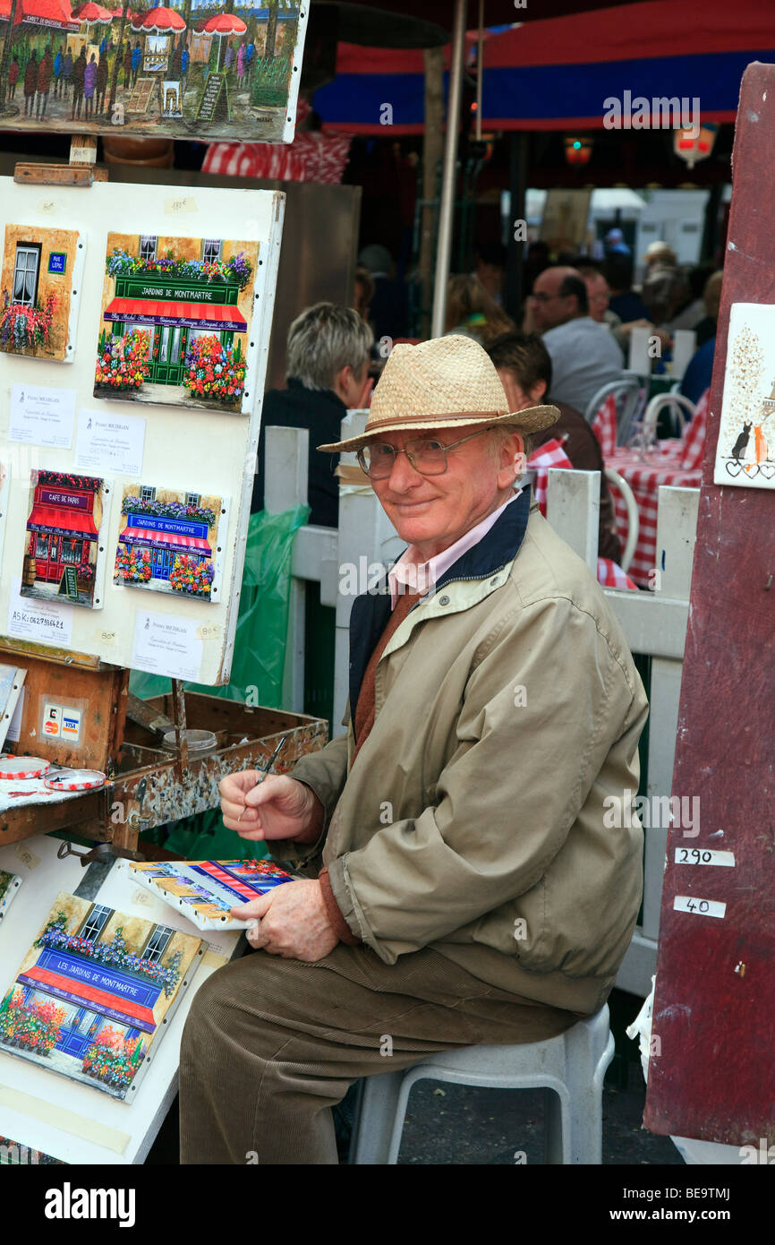 Artist and Paintings in Montmartre in Paris. Stock Photo