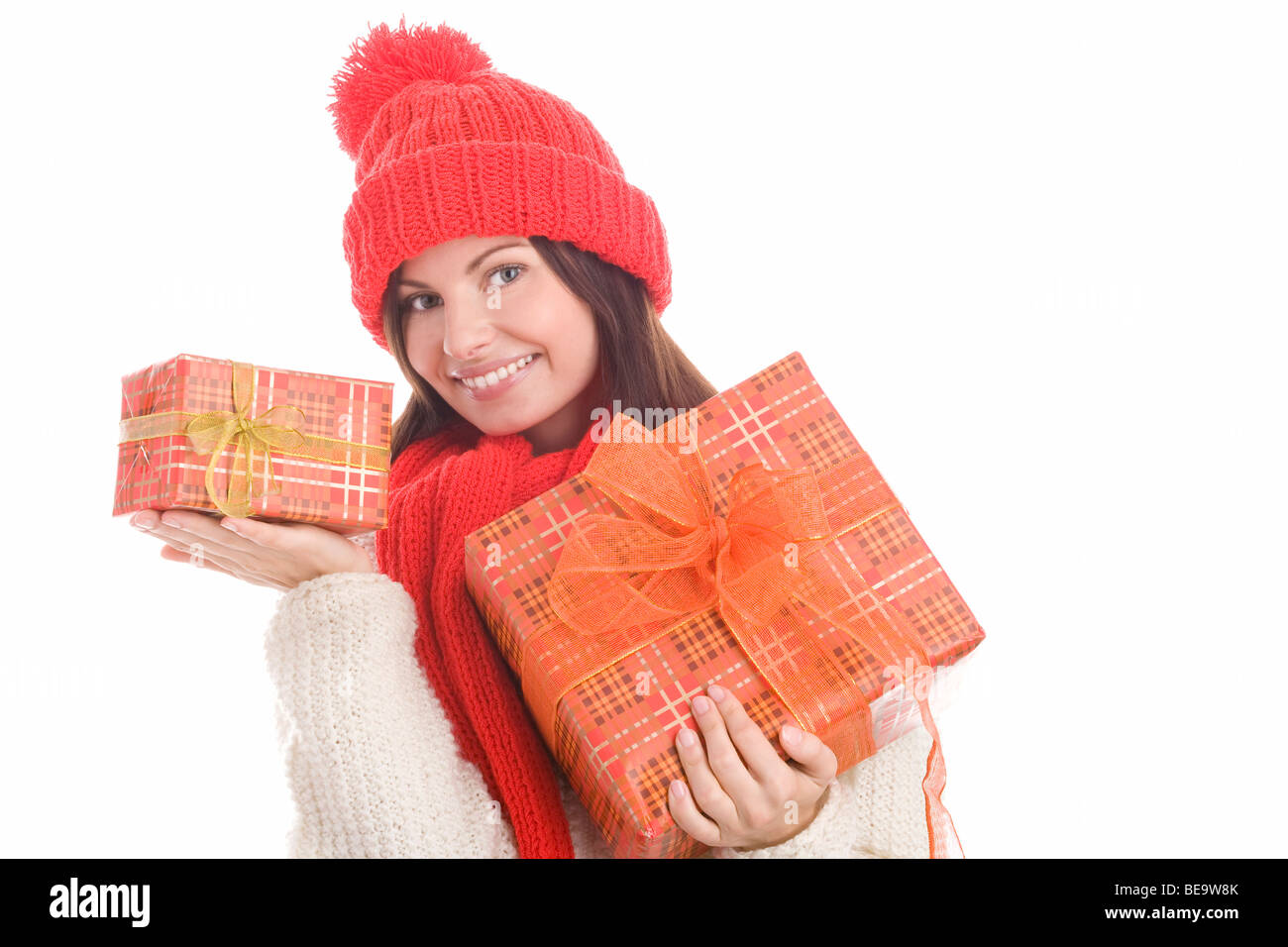 Happy woman with gifts isolated on white background Stock Photo - Alamy