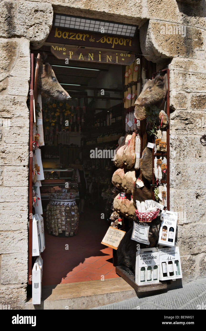 Shop selling sandwiches (panini) and local wine and wild boar products, the old town, San Gimignano, Tuscany, Italy Stock Photo