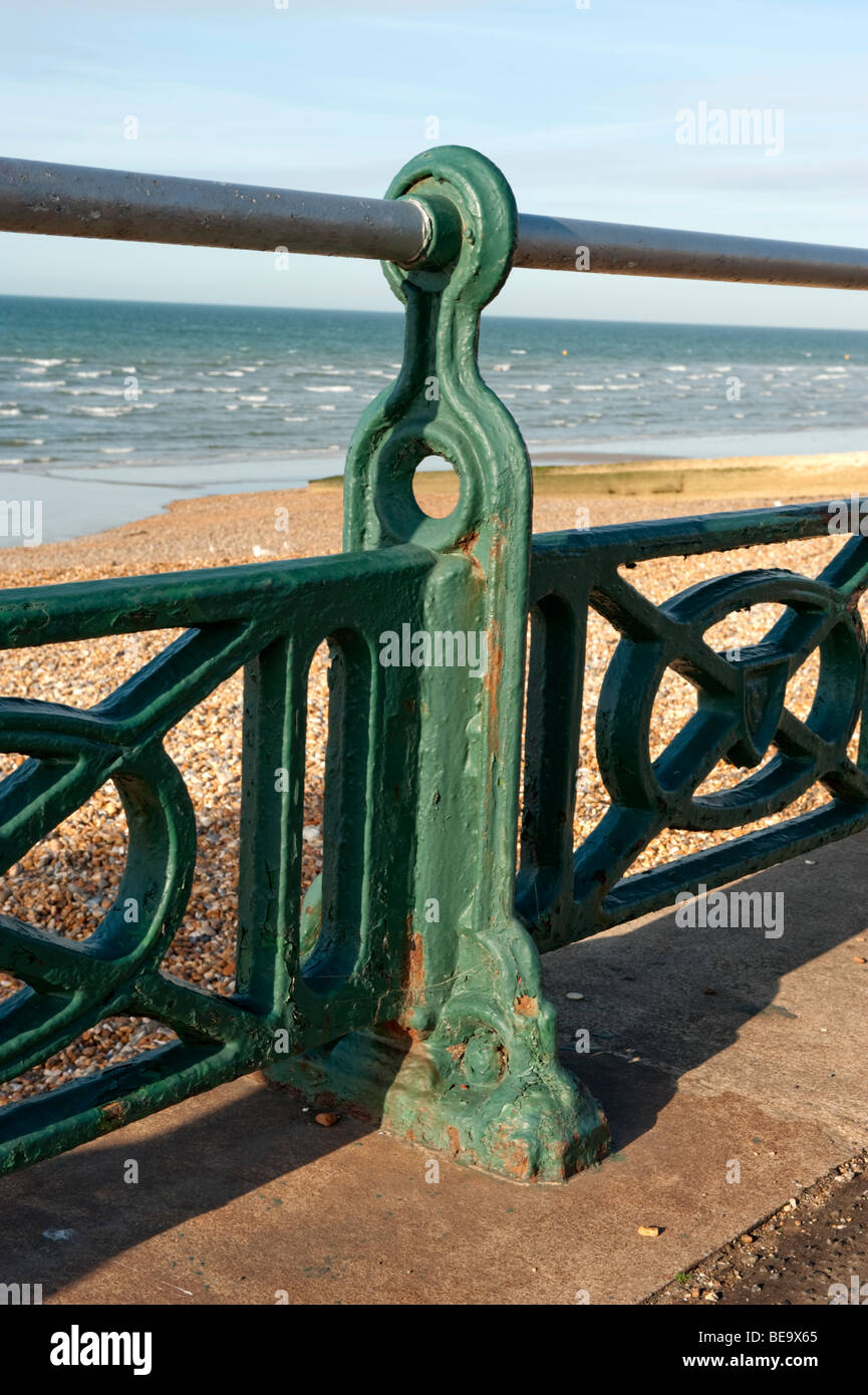 Old Green railing on the sea front - close up Stock Photo