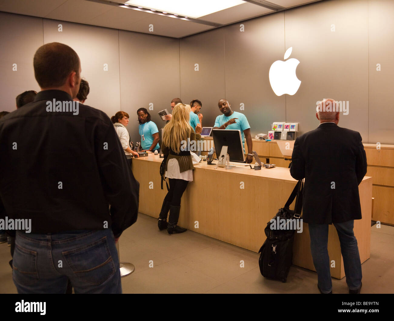 customers-in-checkout-queue-at-apple-store-regent-street-london