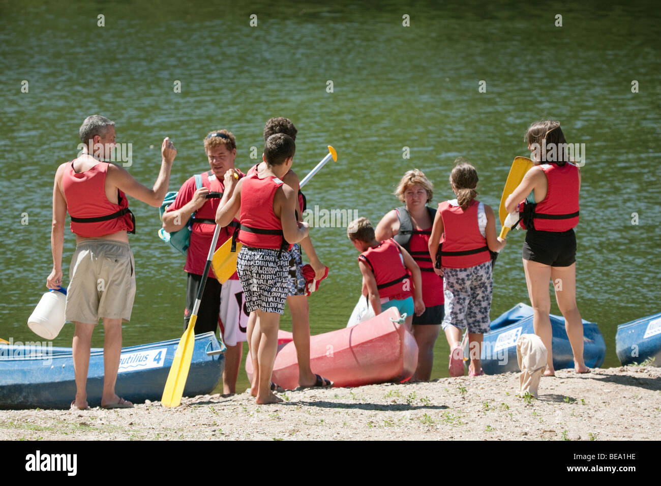 People wearing life jackets hi-res stock photography and images - Alamy