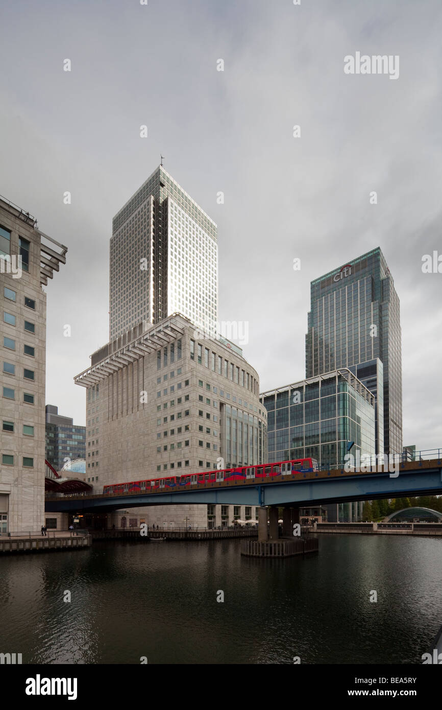 Docklands Light Railway train with Canary Wharf tower, Isle of Dogs, London, England, UK Stock Photo