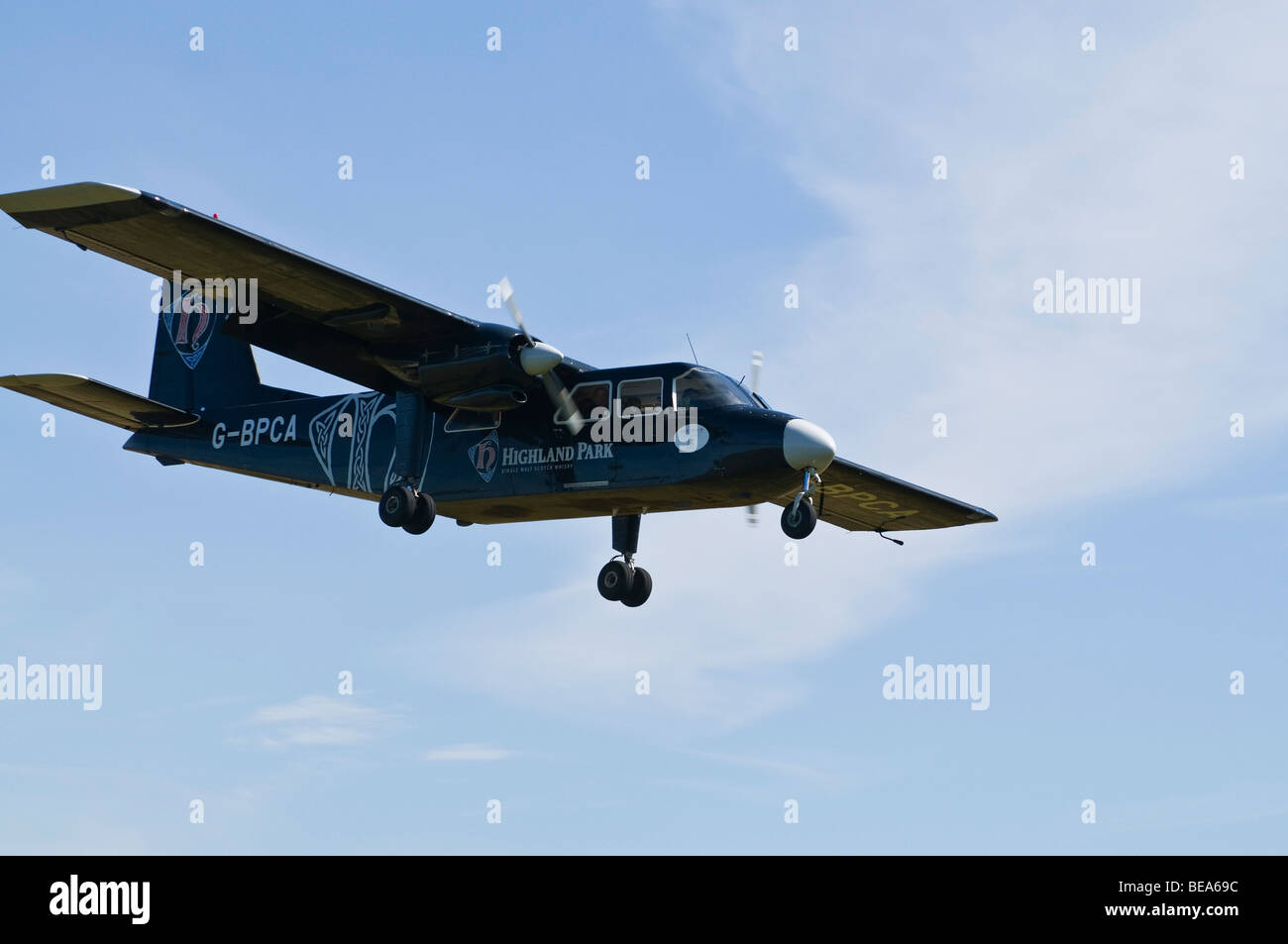 dh Britten Norman Islander BN2 NORTH RONALDSAY ORKNEY ISLES Loganair turboprop airplane inter island in flight small aircraft propellor flying plane Stock Photo