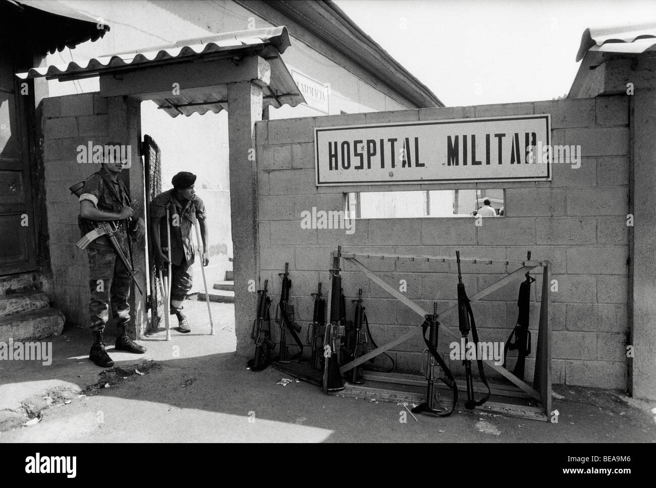 SAN SALVADOR, EL SALVADOR, MAY 1986: A Salvadoran soldier who has had a foot blown off by a mine prepares to leave the military hospital.   The F.M.L.N. guerillas are making increasing use of home-made plastic mines.   Photo by Mike Goldwater Stock Photo