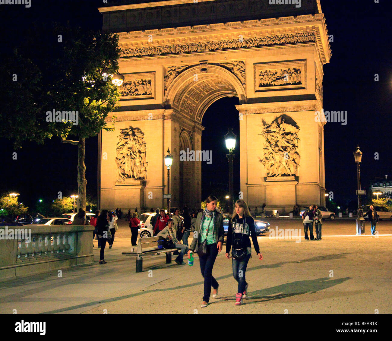 The Arc de Triomphe in Paris at night, Stock Photo