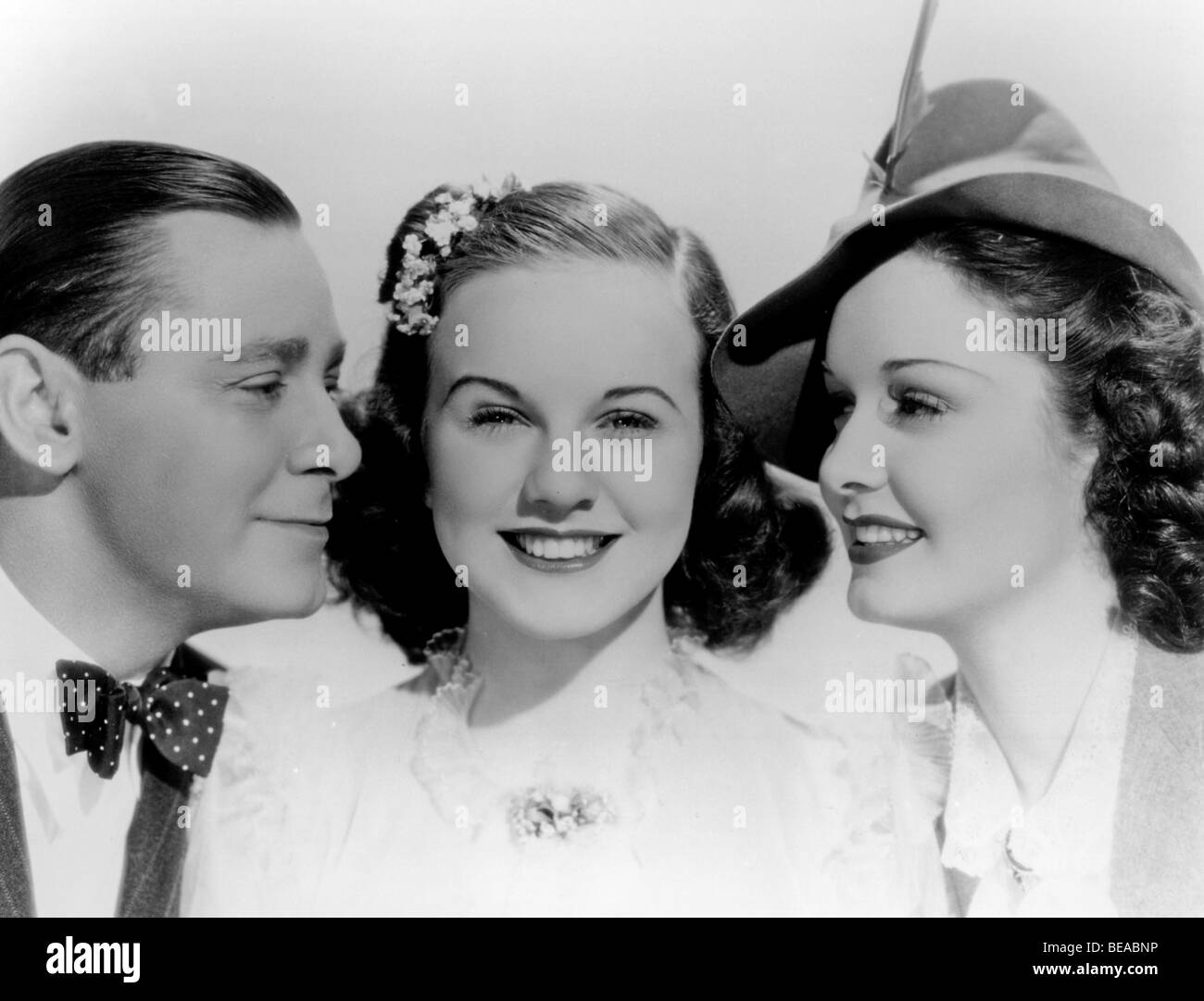 MAD ABOUT MUSIC - 1938 Universal film with from l: Herbert Marshall, Deanna Durbin and Gail Patrick Stock Photo