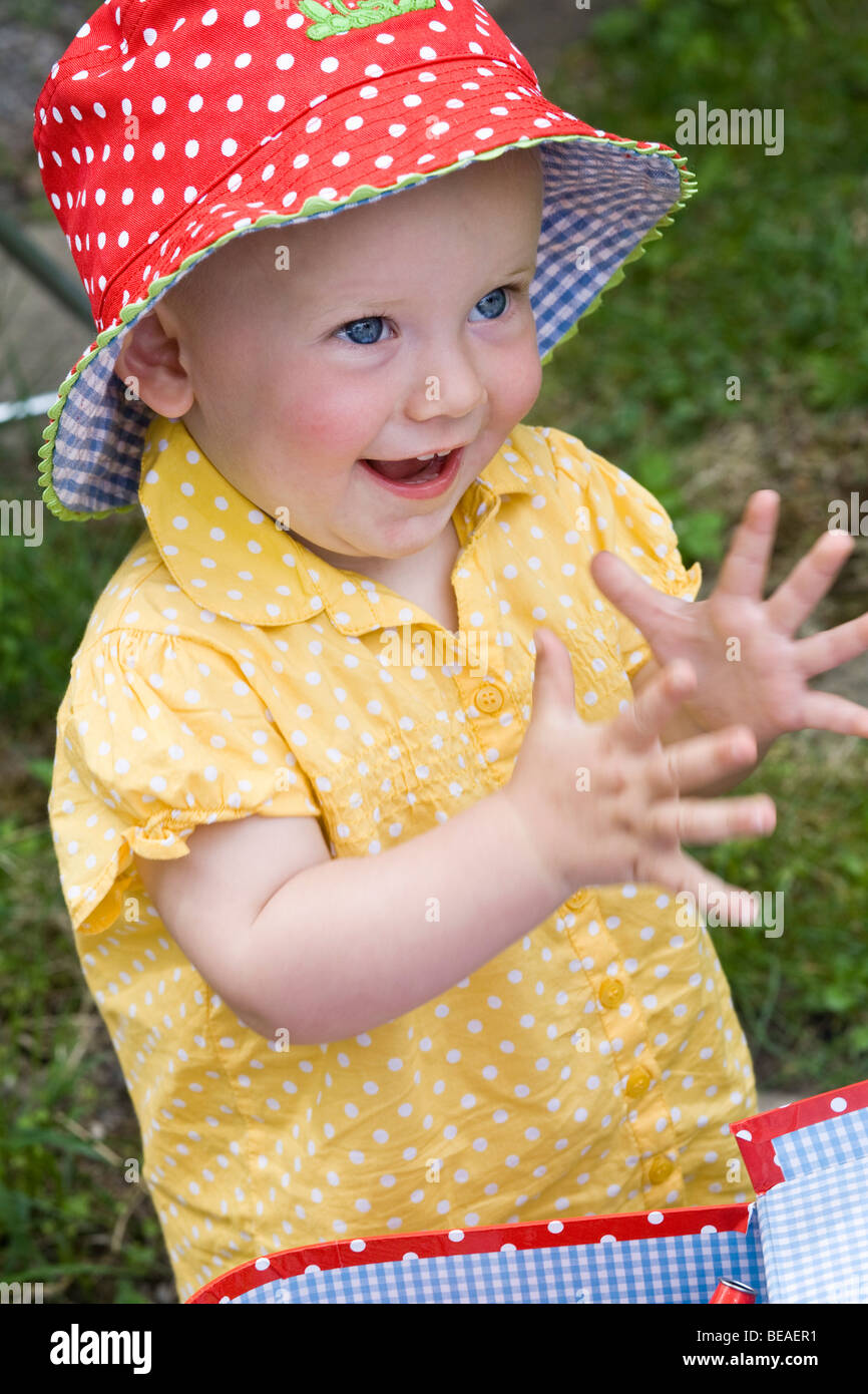 Portrait of a toddler clapping, close-up Stock Photo
