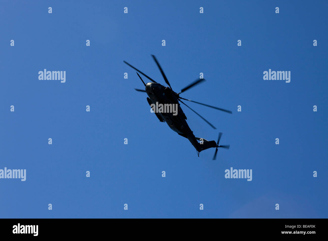 Helicopter flying in the sky Stock Photo