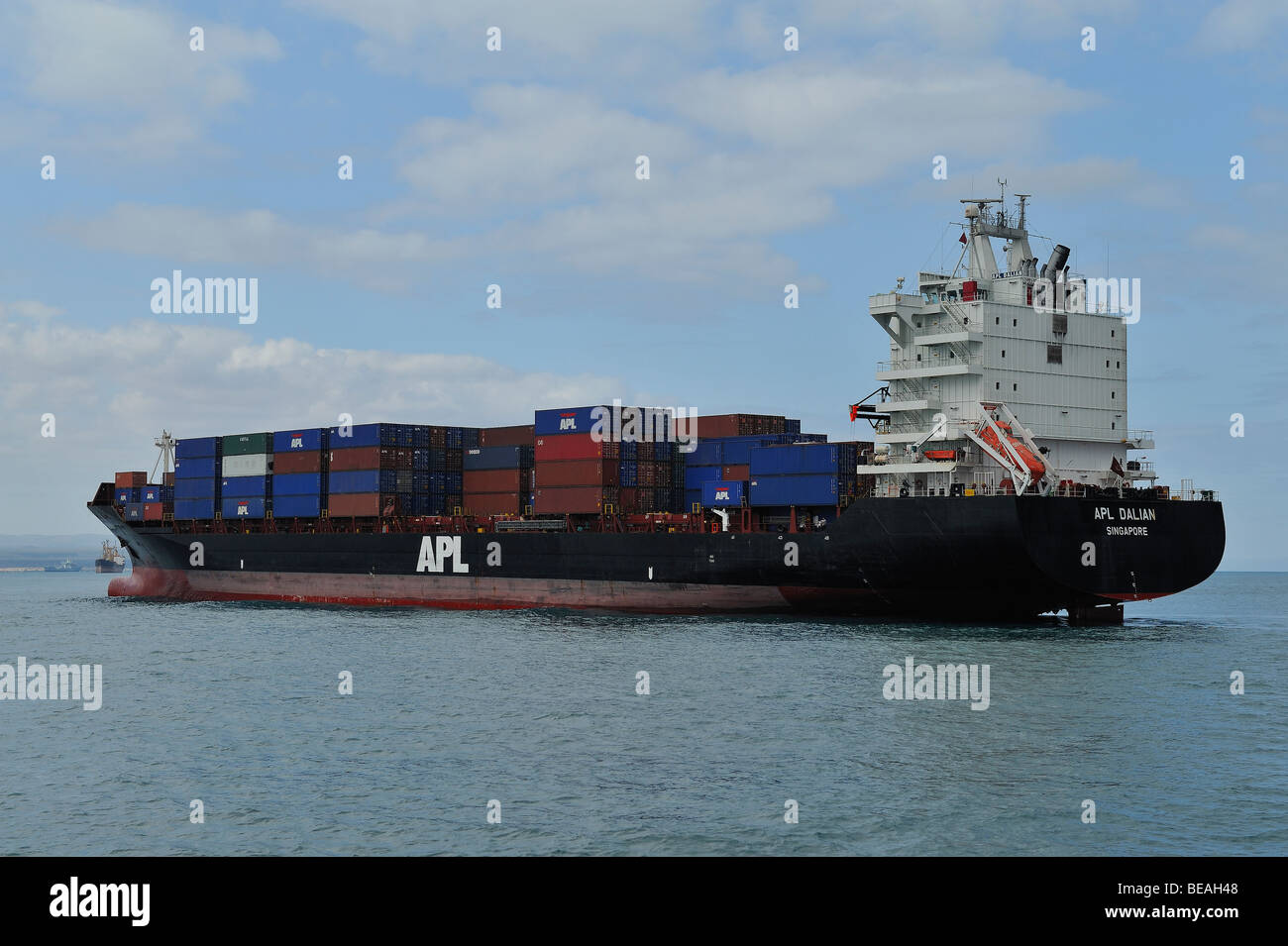 Supertanker boat loaded with containers hires stock photography and