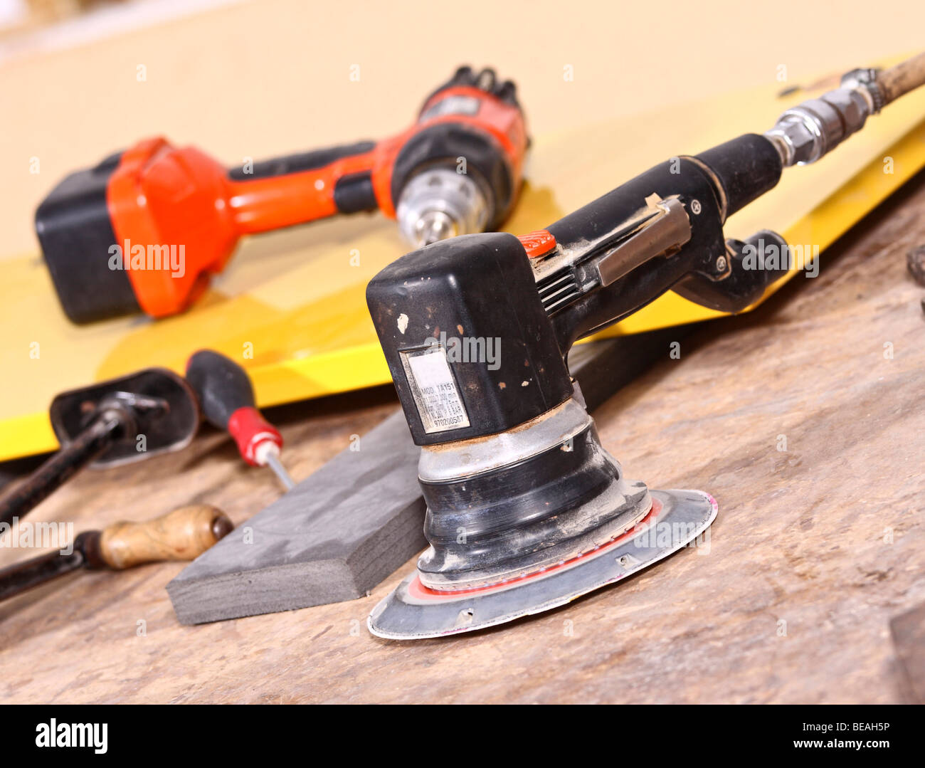 detail of classic tool of manual worker on old wood table Stock Photo