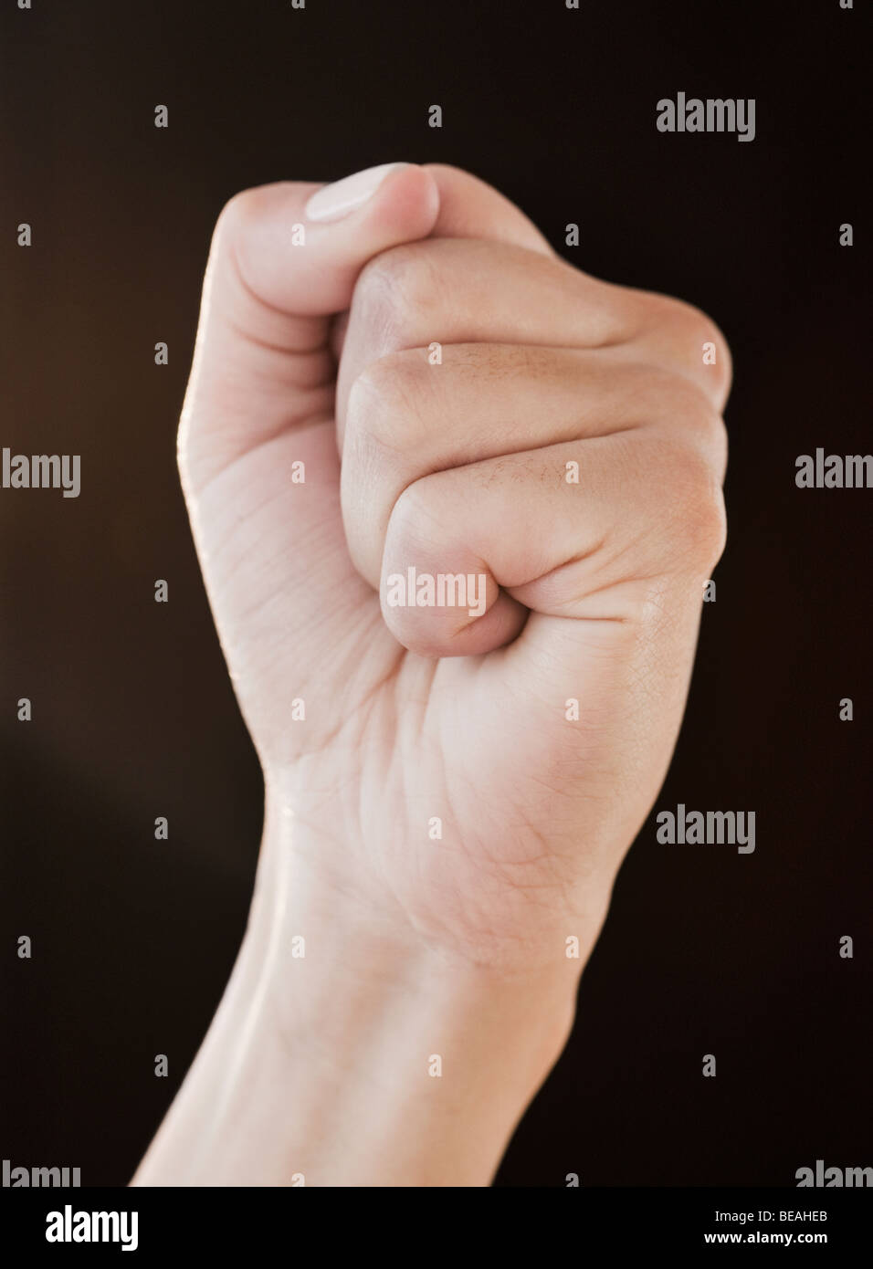 Angry woman fist clenched hires stock photography and images Alamy