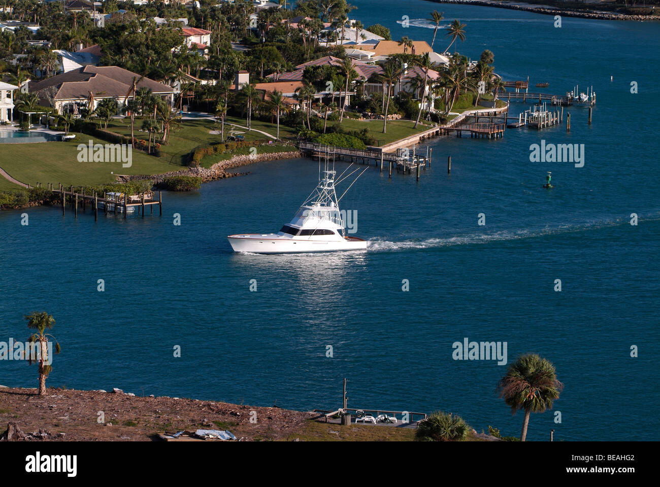 Fishing boat going in the channel of Jupiter harbor, Florida Stock