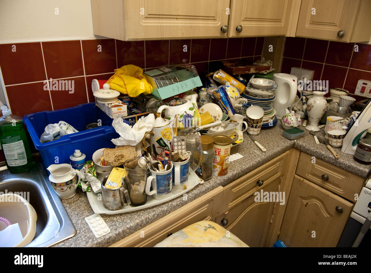 Personal possessions hoarded by elderly person in their home causing health hazard Stock Photo