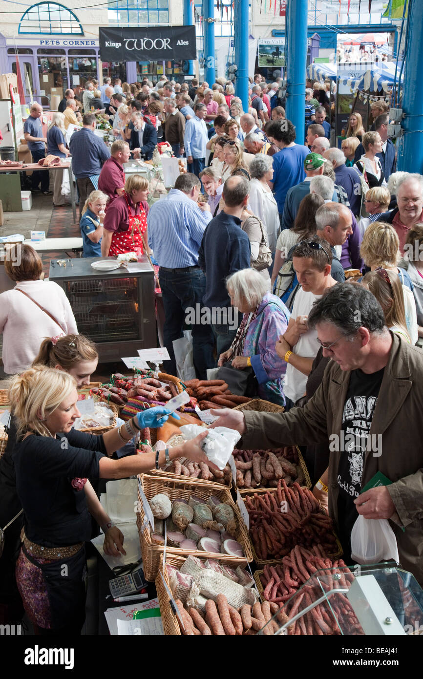 Crowds in the market hall Abergavenny Food Festival Wales UK Stock