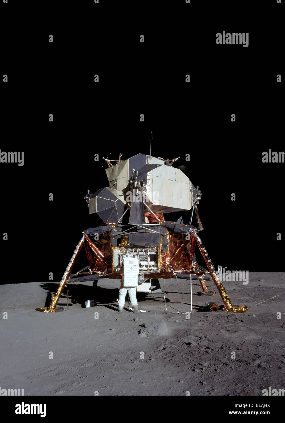 Apollo 11 astronaut Buzz Aldrin and the lunar module on the moon. Credit: NASA/Neil Armstrong. Optimised version of a NASA image Stock Photo