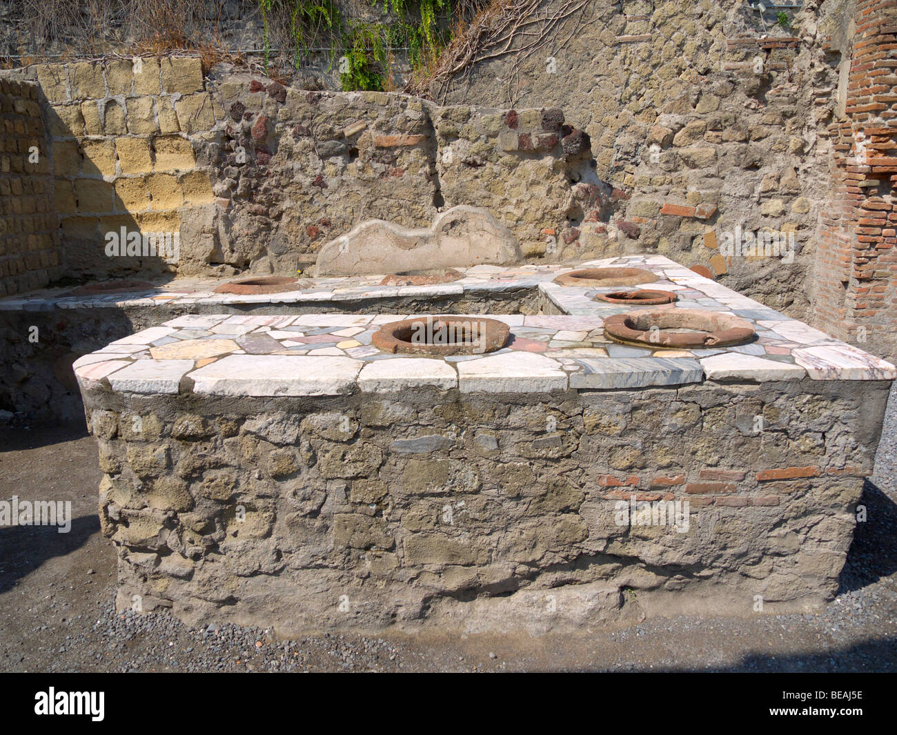 Shop on the Buried Roman City of Herculaneum near Naples in Southern Italy Stock Photo