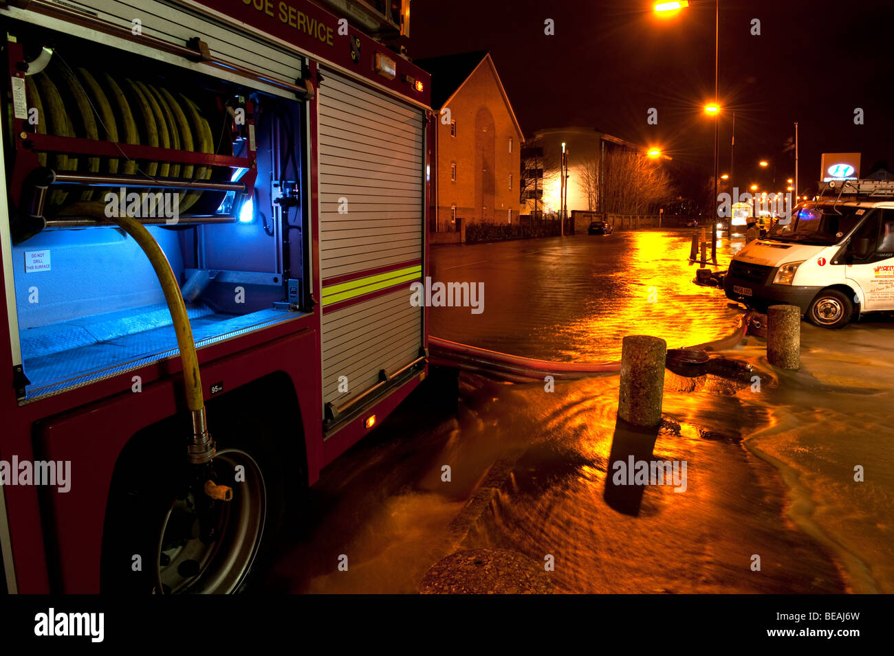 Fire engine at flooding incident at night Stock Photo