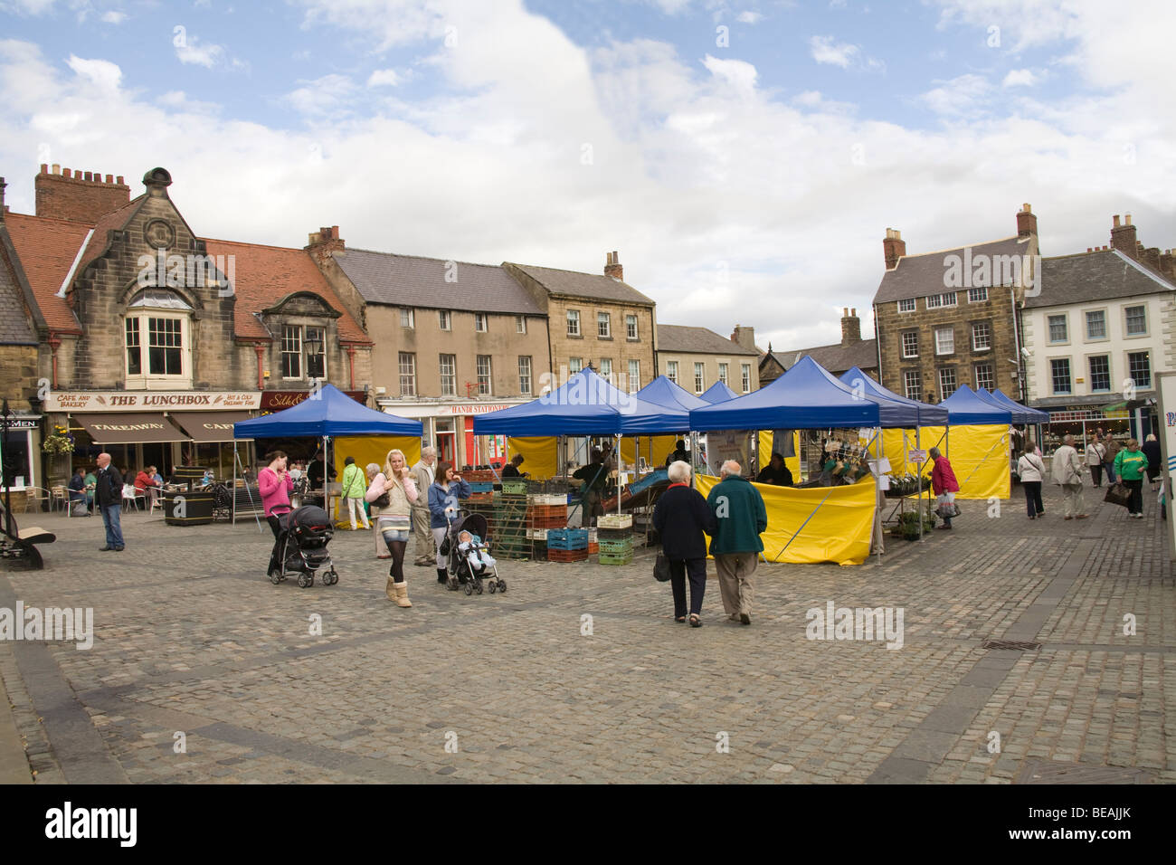 Alnwick Northumberland England UK Customers at the Farmers market in Market Place Stock Photo