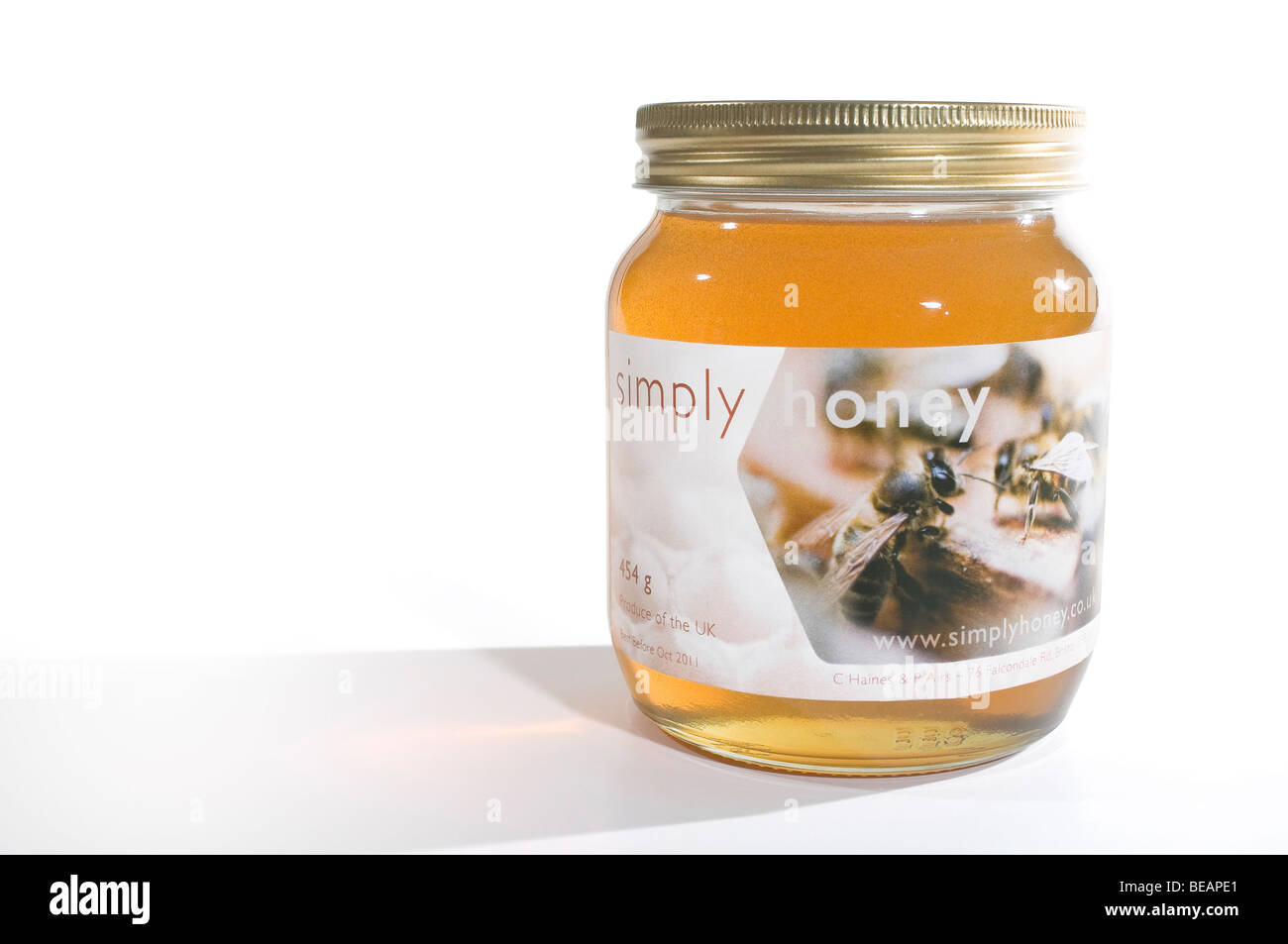 Simply Honey labelled full jar of honey Stock Photo