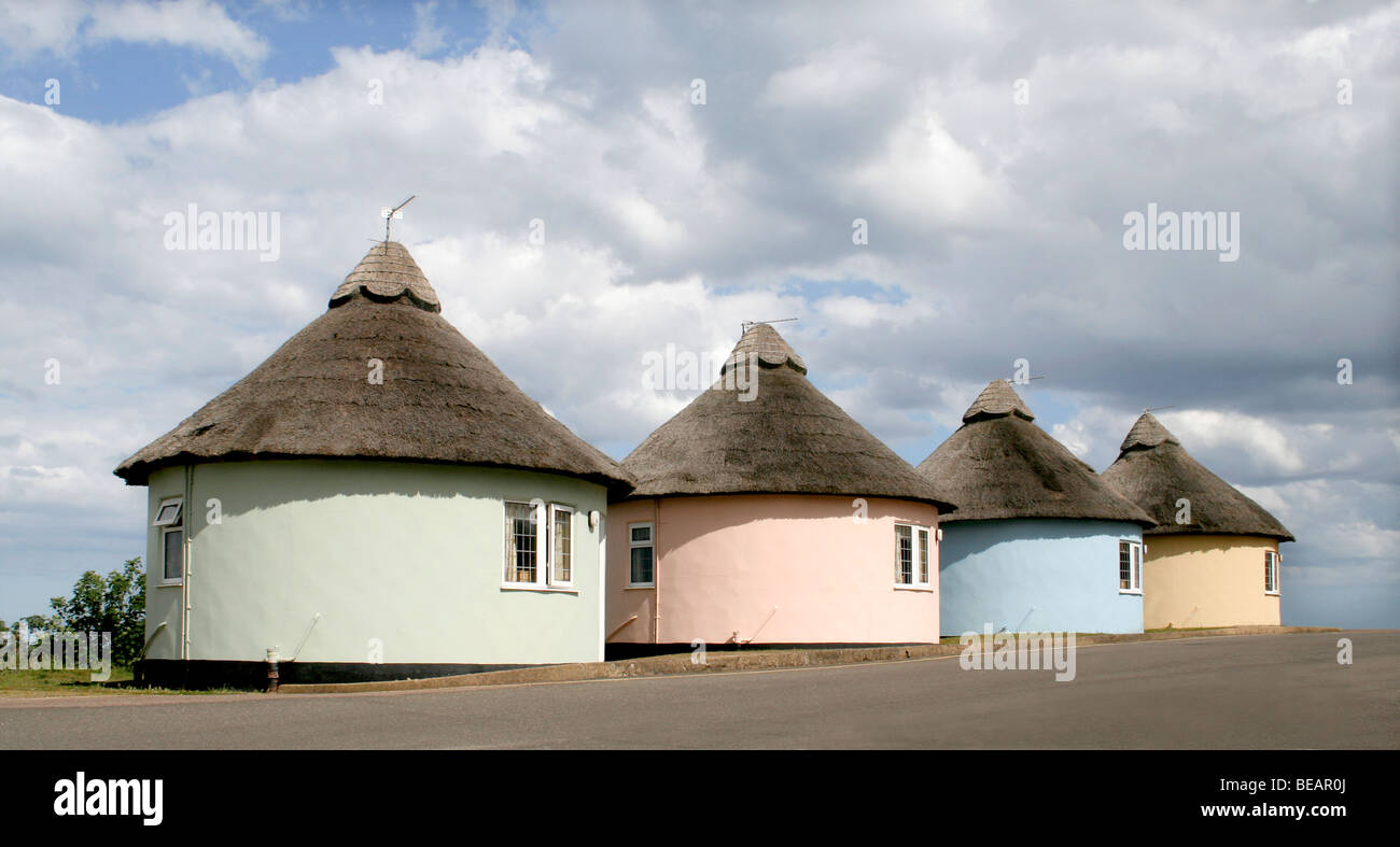Colourful round Thatched  holiday homes at Winterton-on-sea Norfolk Stock Photo