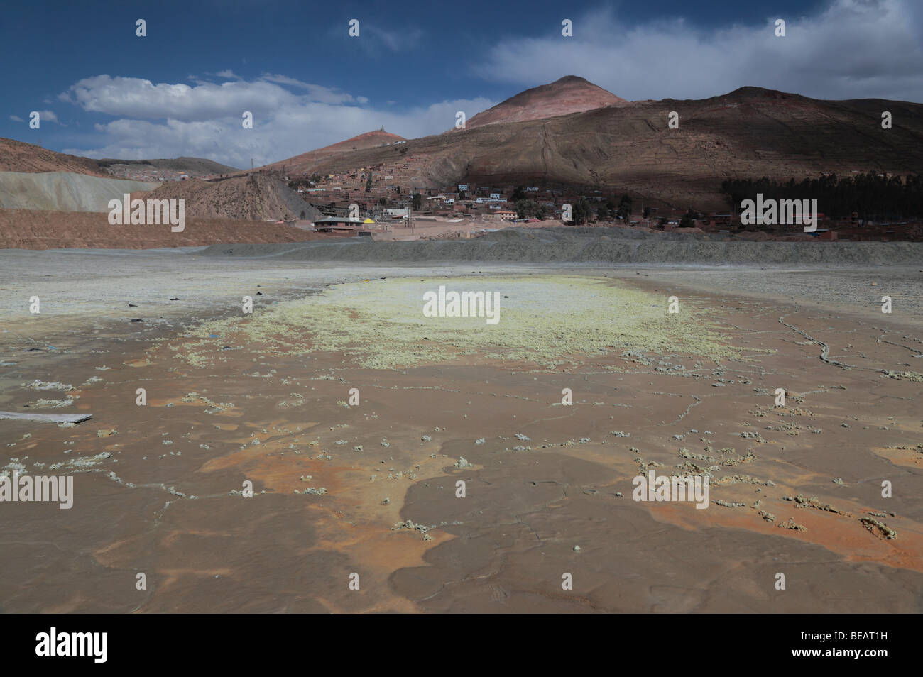 Tailings waste from nearby tin mines on outskirts of Potosi , Cerro Rico in background , Bolivia Stock Photo