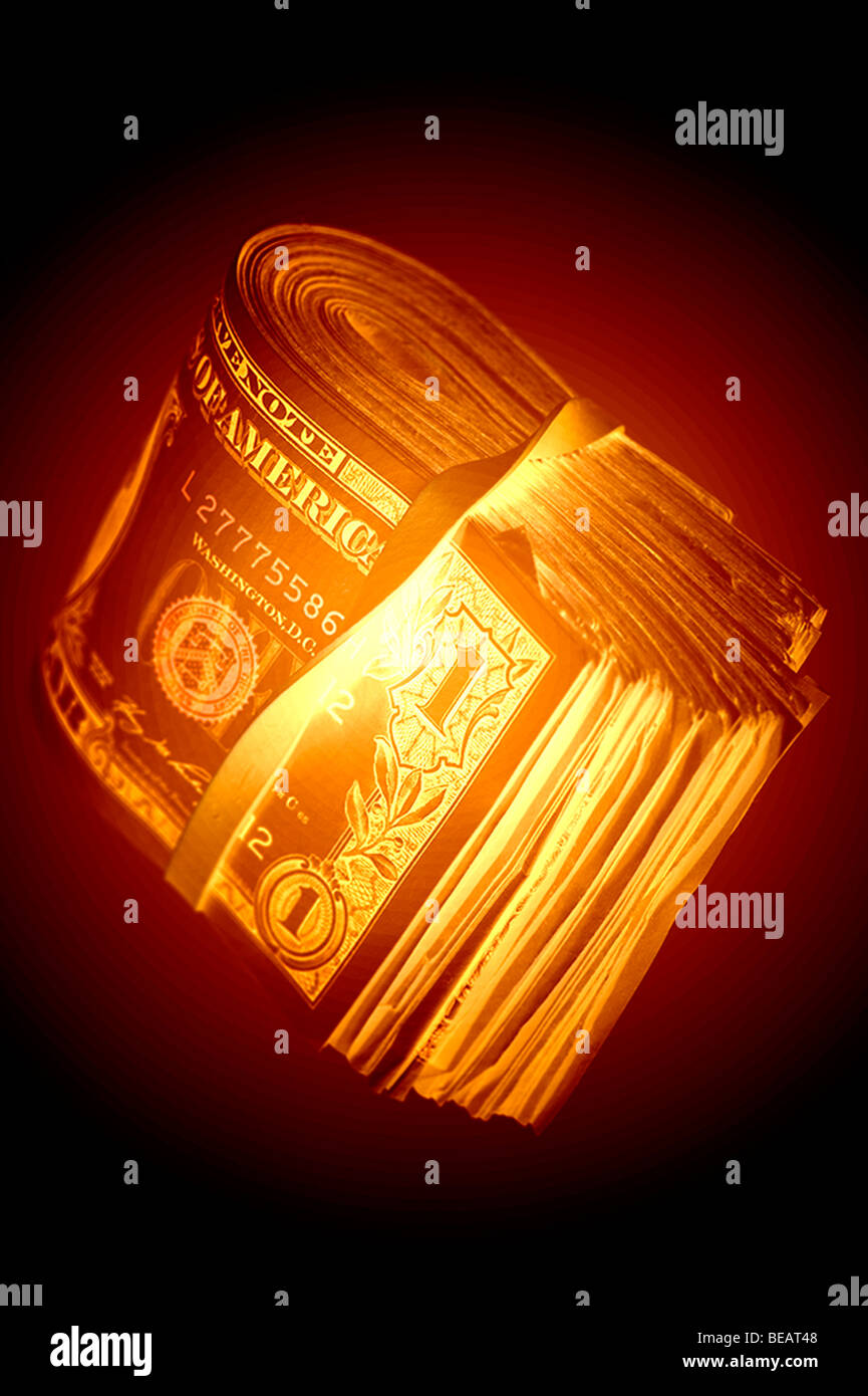 one dollar bills folded in rubber band gold coloring Stock Photo