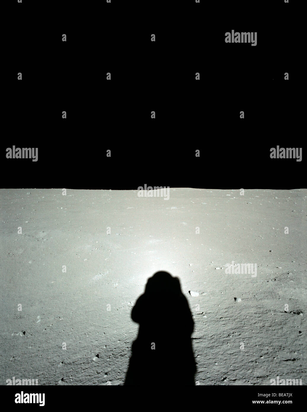 Shadow of Apollo 11 astronaut cast across the lunar surface. Optimised and enhanced version of original NASA image Credit NASA Stock Photo