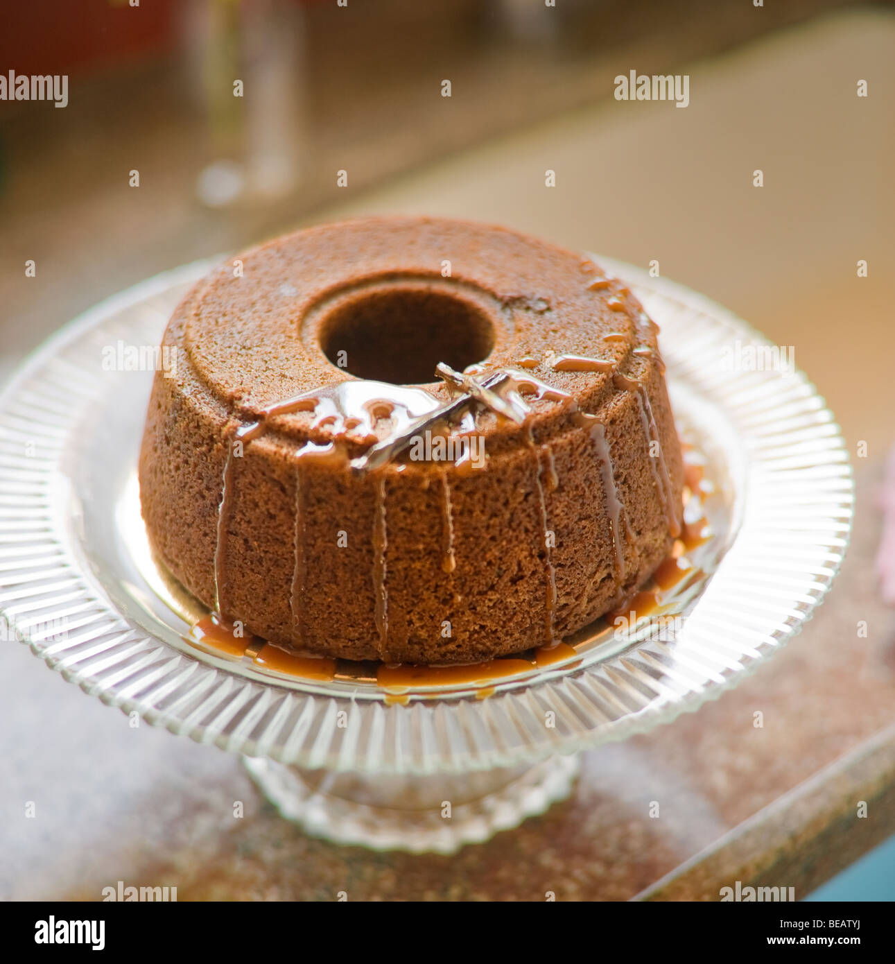 close-up on a dripping honey cake Stock Photo